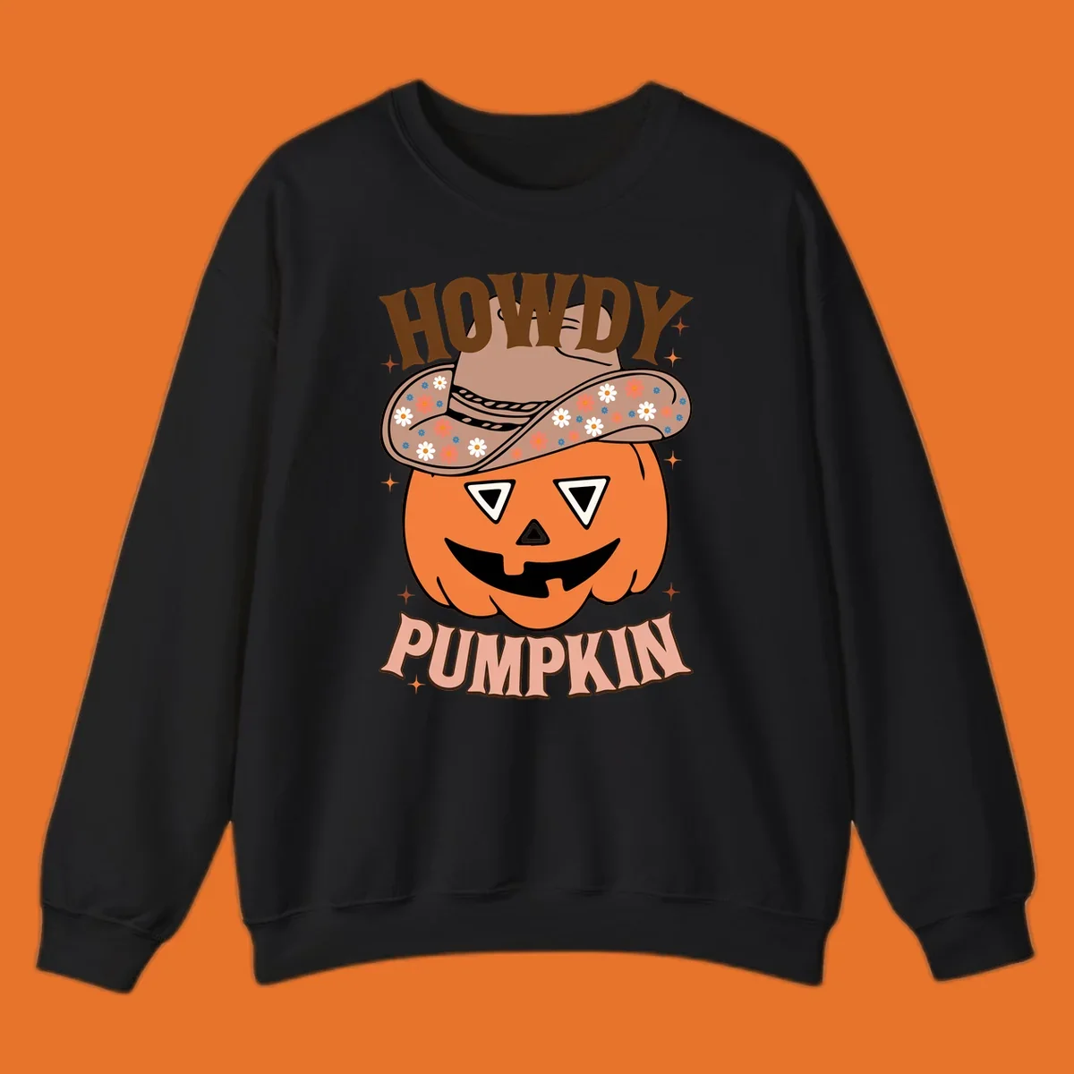 Howdy Pumpkin cowboy hat illustration for Halloween, with retro-style text and floral accents.