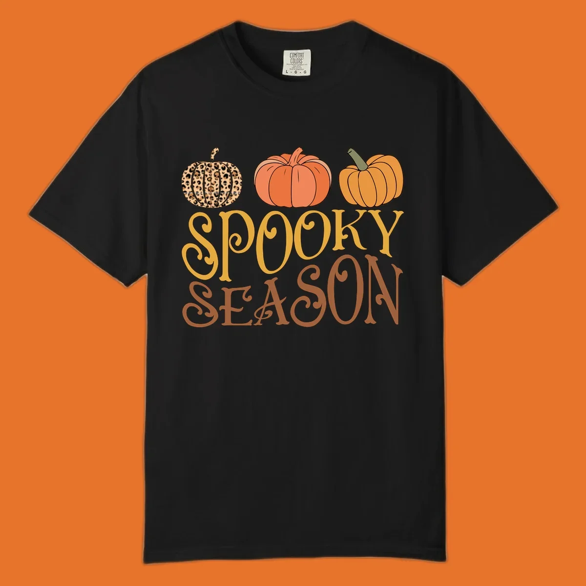 Spooky season pumpkins with leopard print and skull design, text: SPOOKY SEASON.
