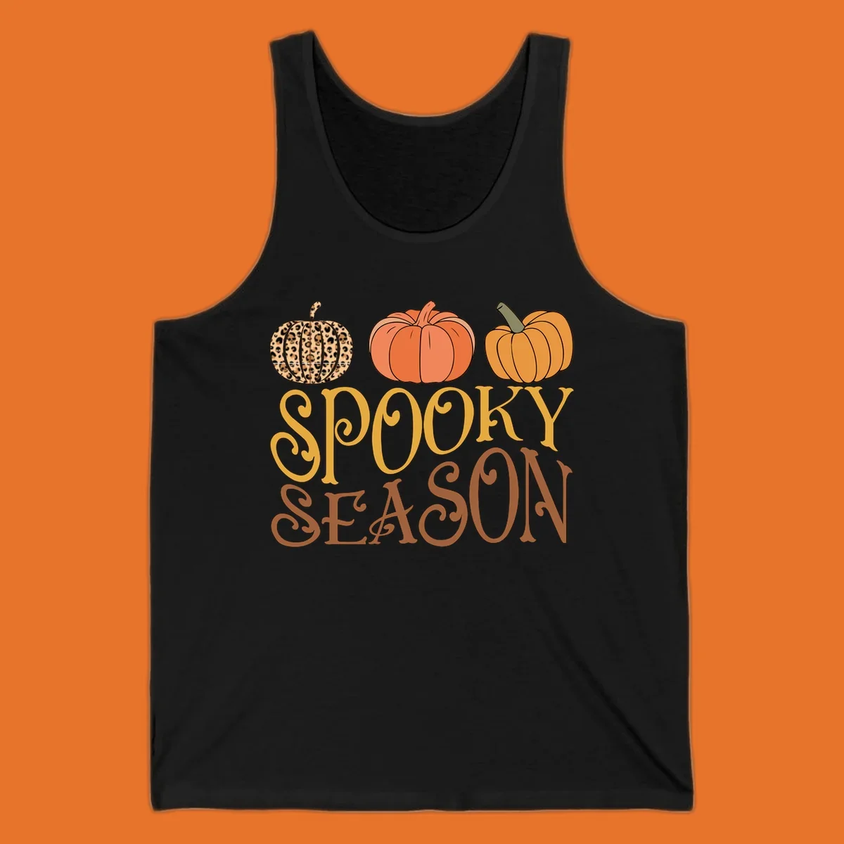Spooky season pumpkins with leopard print and skull design, text: SPOOKY SEASON.
