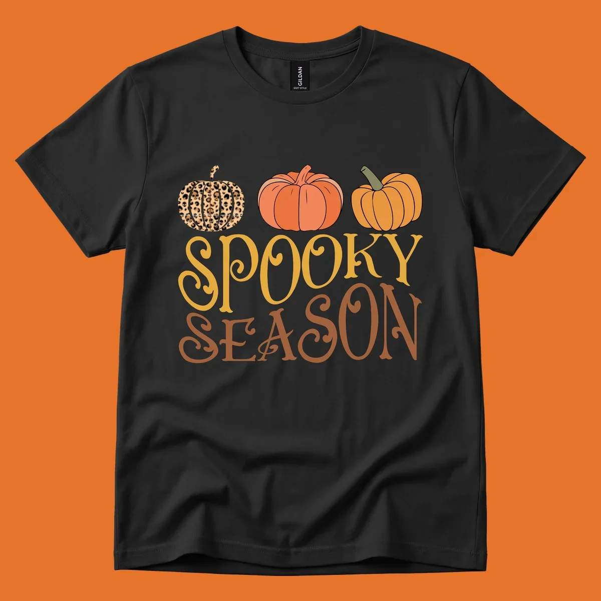 Spooky season pumpkins with leopard print and skull design, text: SPOOKY SEASON.