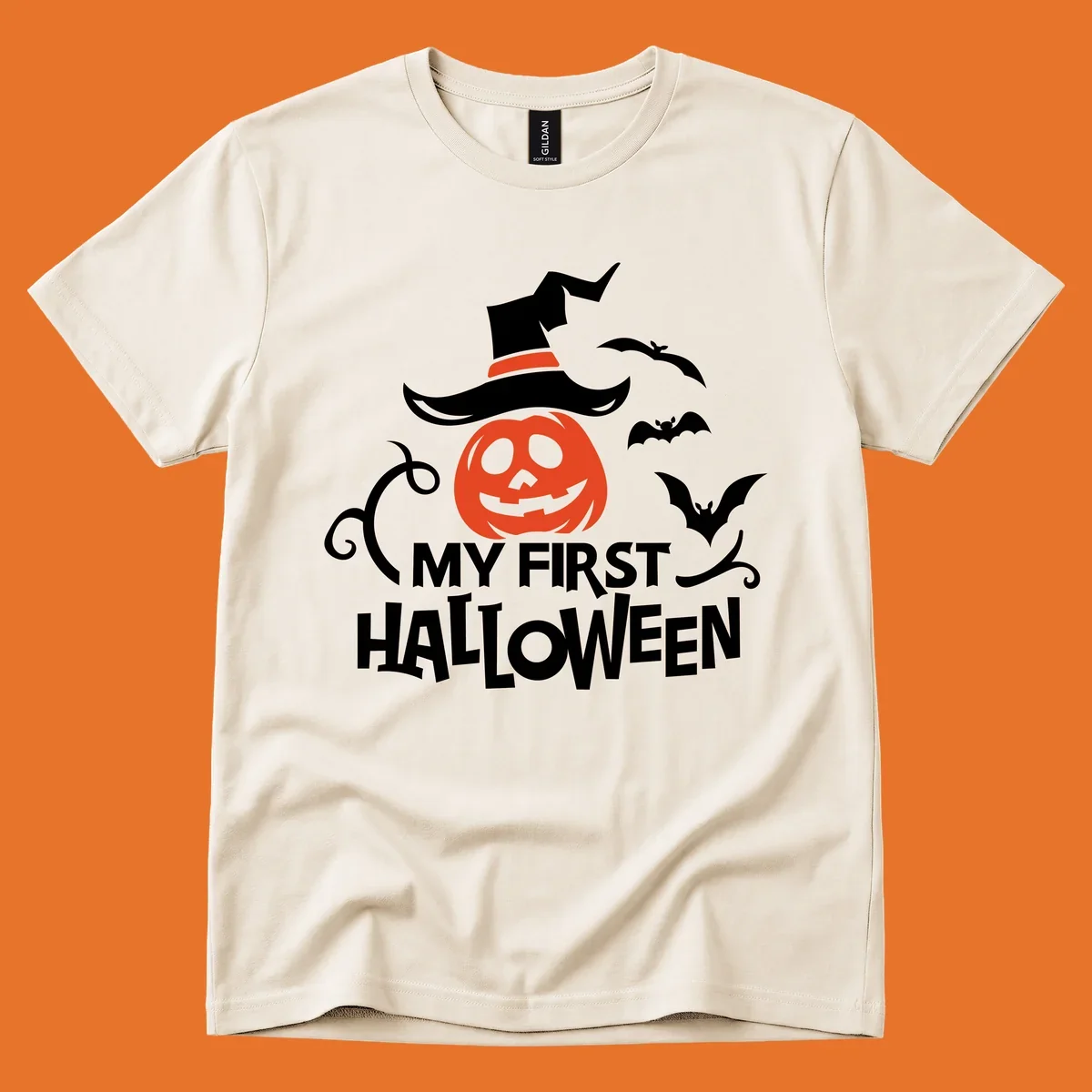 My First Halloween text with a pumpkin wearing a witch hat and bats.