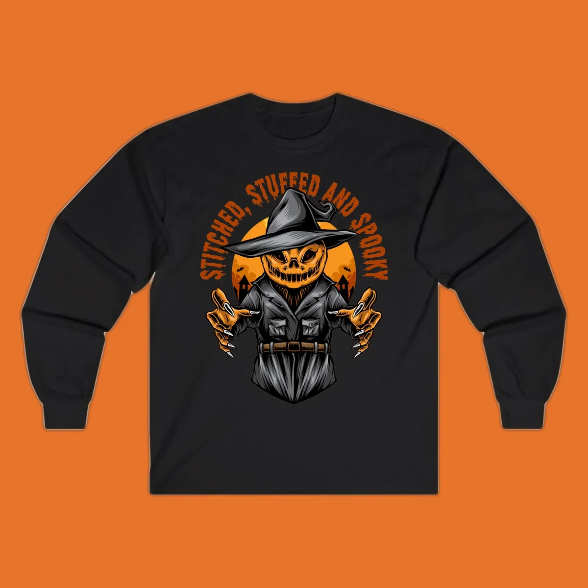 Spooky pumpkin character in a witch hat and suit, text reads STITCHED, STUFFED AND SPOOKY.