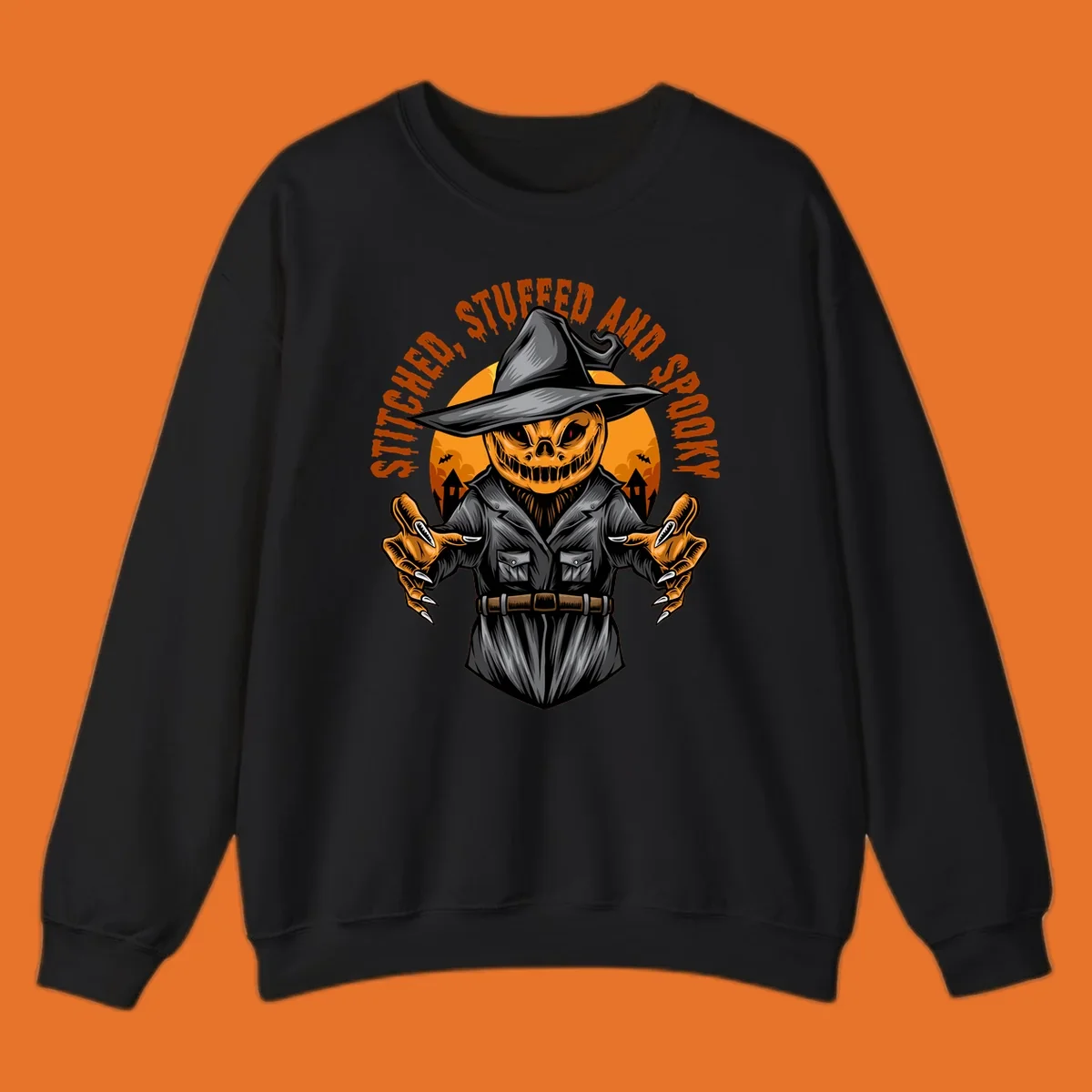 Spooky pumpkin character in a witch hat and suit, text reads STITCHED, STUFFED AND SPOOKY.