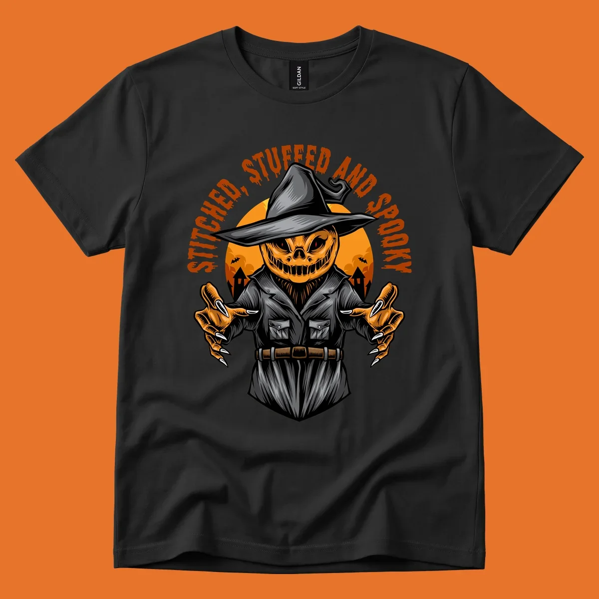 Spooky pumpkin character in a witch hat and suit, text reads STITCHED, STUFFED AND SPOOKY.