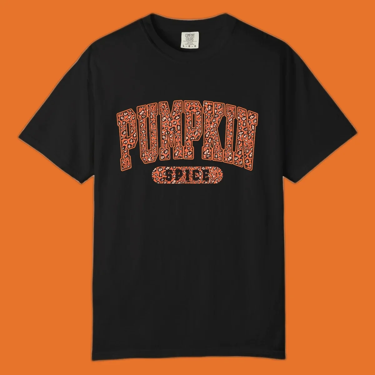 Pumpkin Spice text with leopard print pattern on dark outline, on black background.