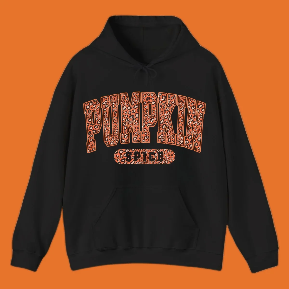 Pumpkin Spice text with leopard print pattern on dark outline, on black background.