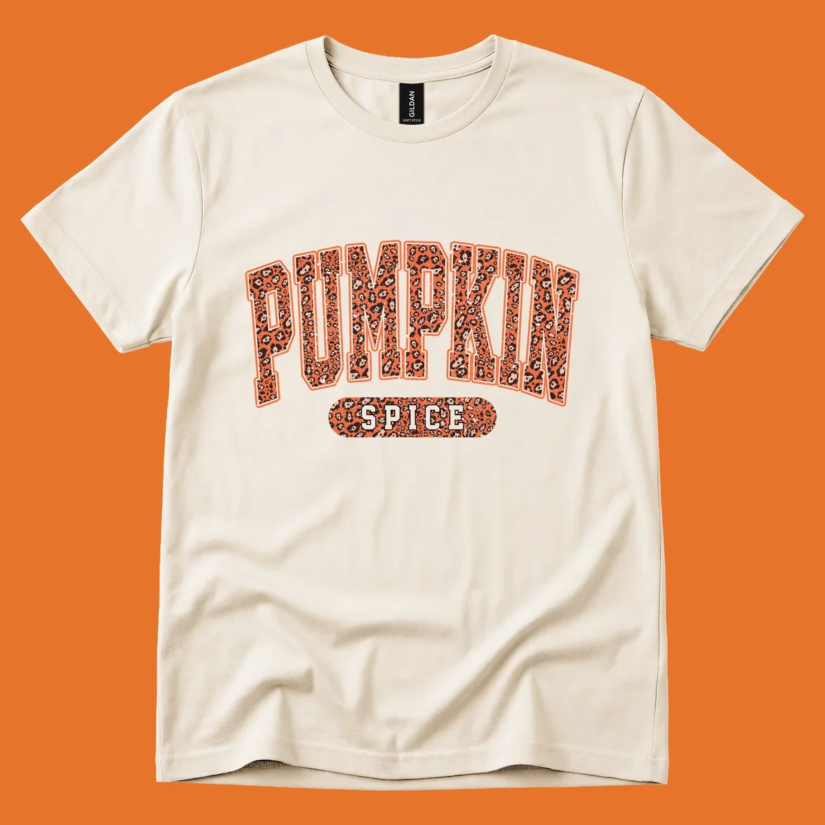 Pumpkin Spice text with leopard print pattern on dark outline, on black background.