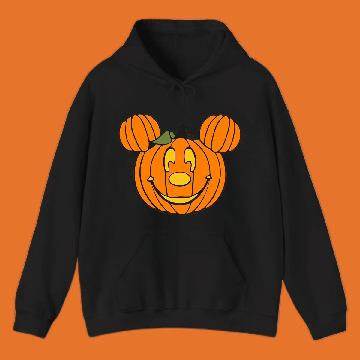 Mickey pumpkin halloween jack-o-lantern graphic with smiling face and ears.