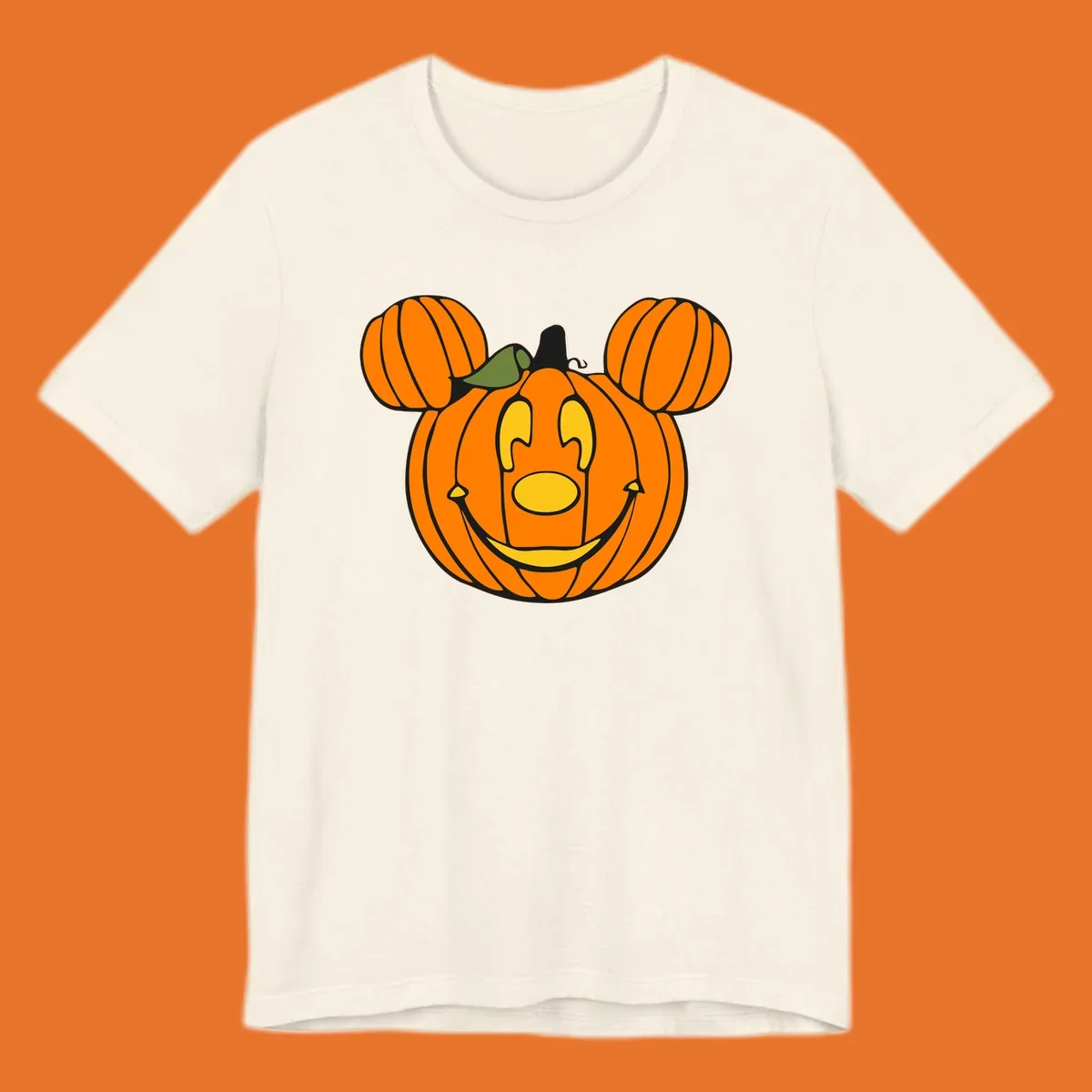 Mickey pumpkin halloween jack-o-lantern graphic with smiling face and ears.