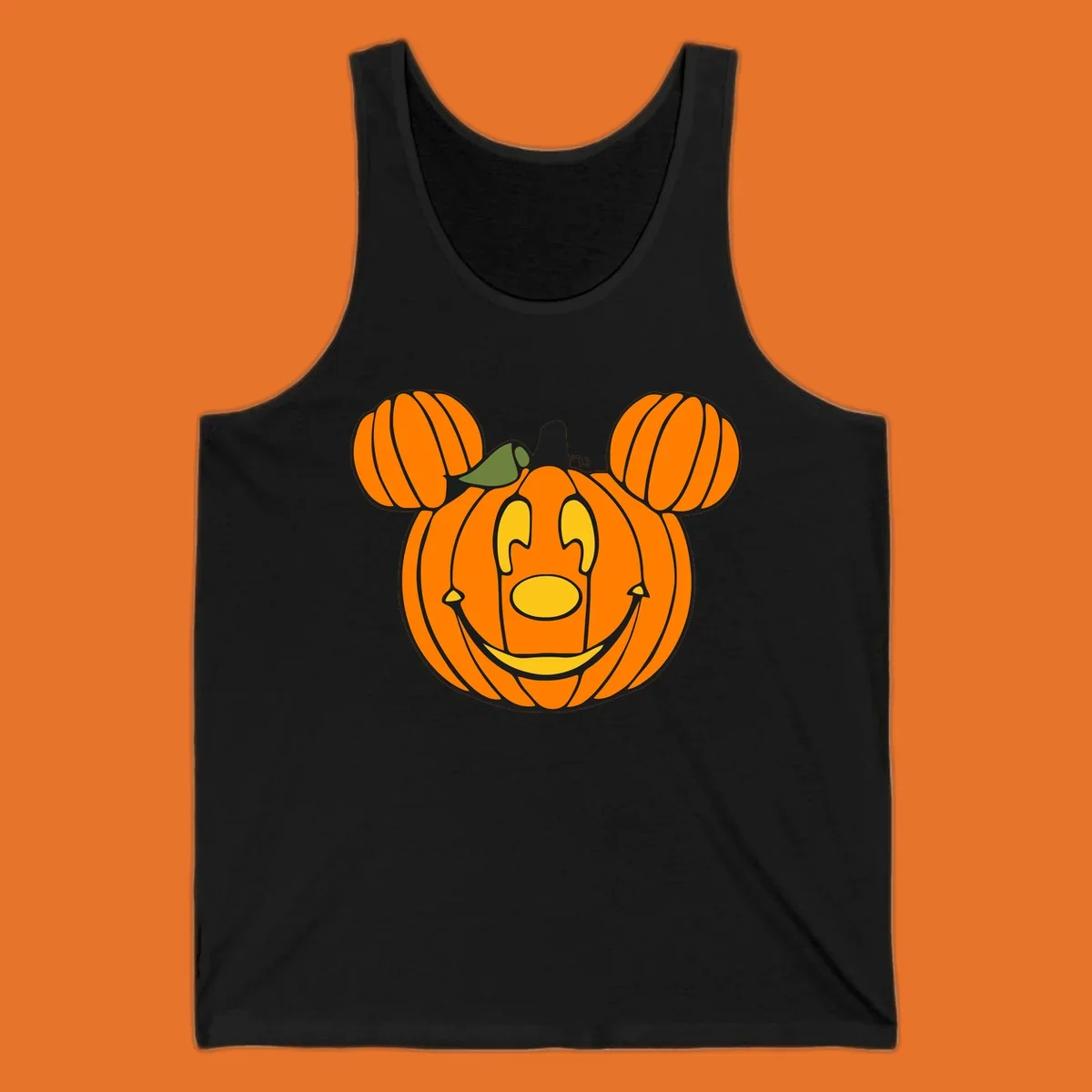 Mickey pumpkin halloween jack-o-lantern graphic with smiling face and ears.