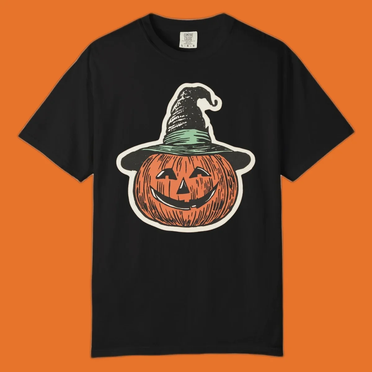 Vintage illustration of a smiling jack-o-lantern wearing a witch hat, perfect for halloween-pumpkin-witch themed apparel.