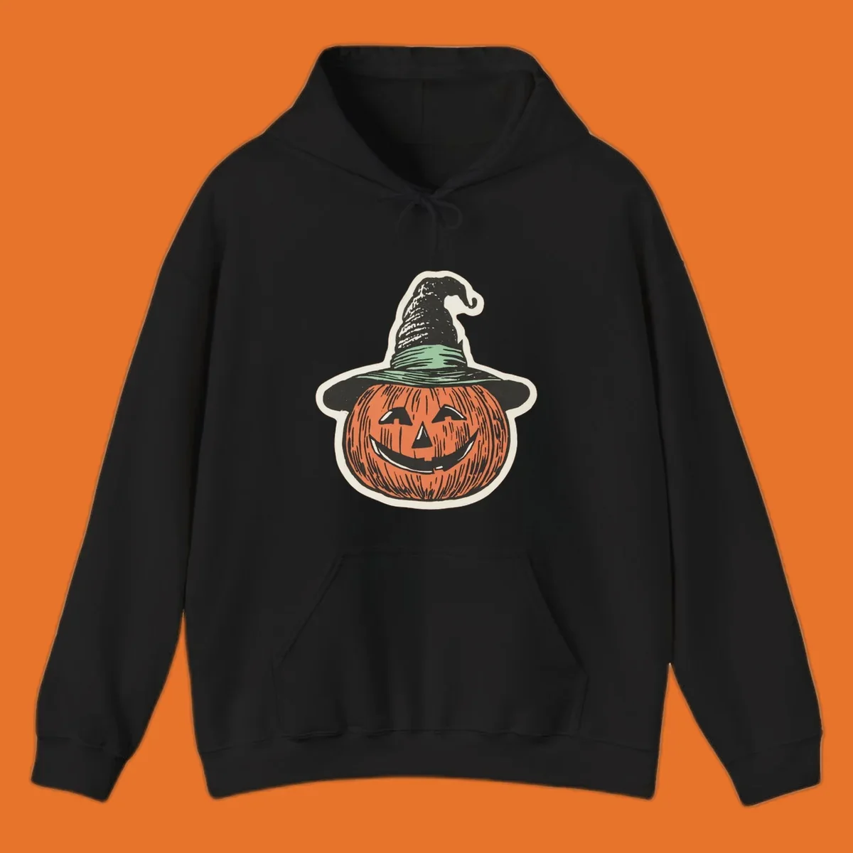 Vintage illustration of a smiling jack-o-lantern wearing a witch hat, perfect for halloween-pumpkin-witch themed apparel.