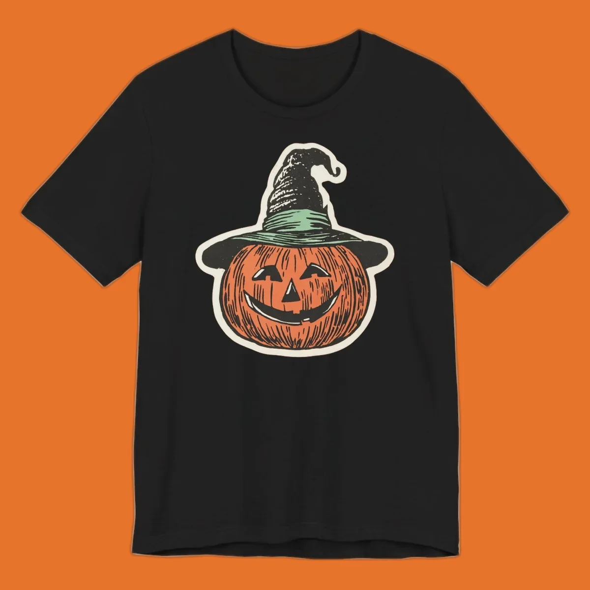Vintage illustration of a smiling jack-o-lantern wearing a witch hat, perfect for halloween-pumpkin-witch themed apparel.