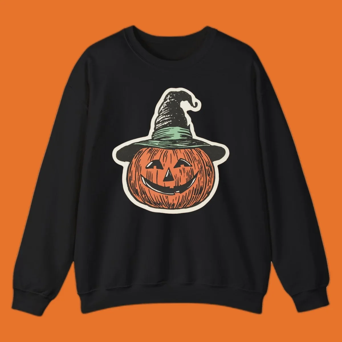 Vintage illustration of a smiling jack-o-lantern wearing a witch hat, perfect for halloween-pumpkin-witch themed apparel.
