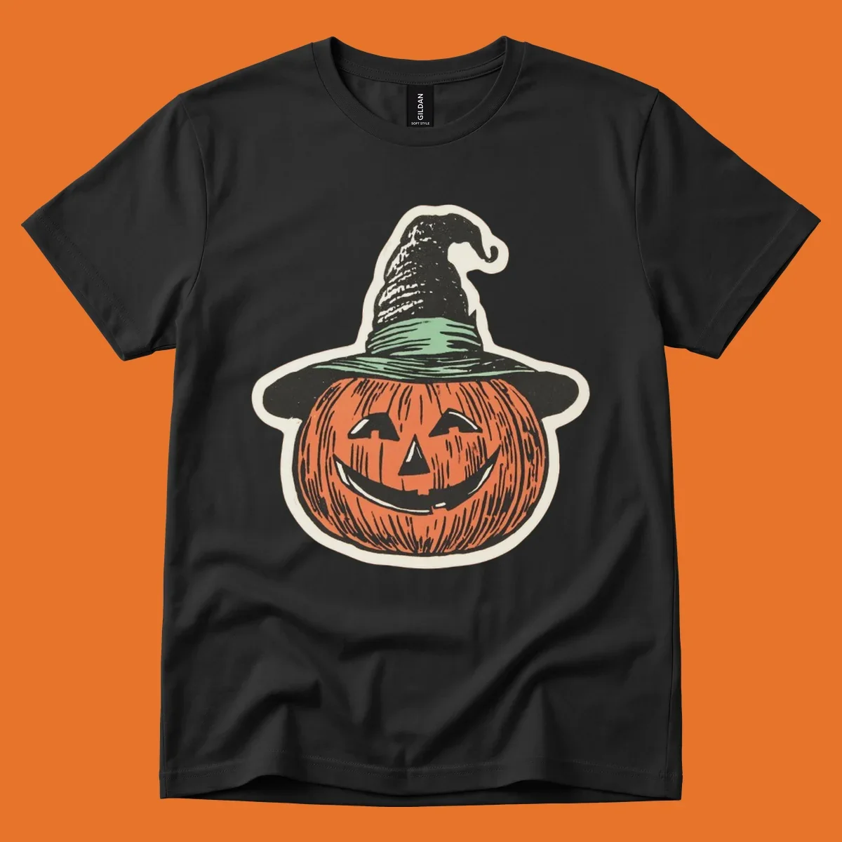 Vintage illustration of a smiling jack-o-lantern wearing a witch hat, perfect for halloween-pumpkin-witch themed apparel.