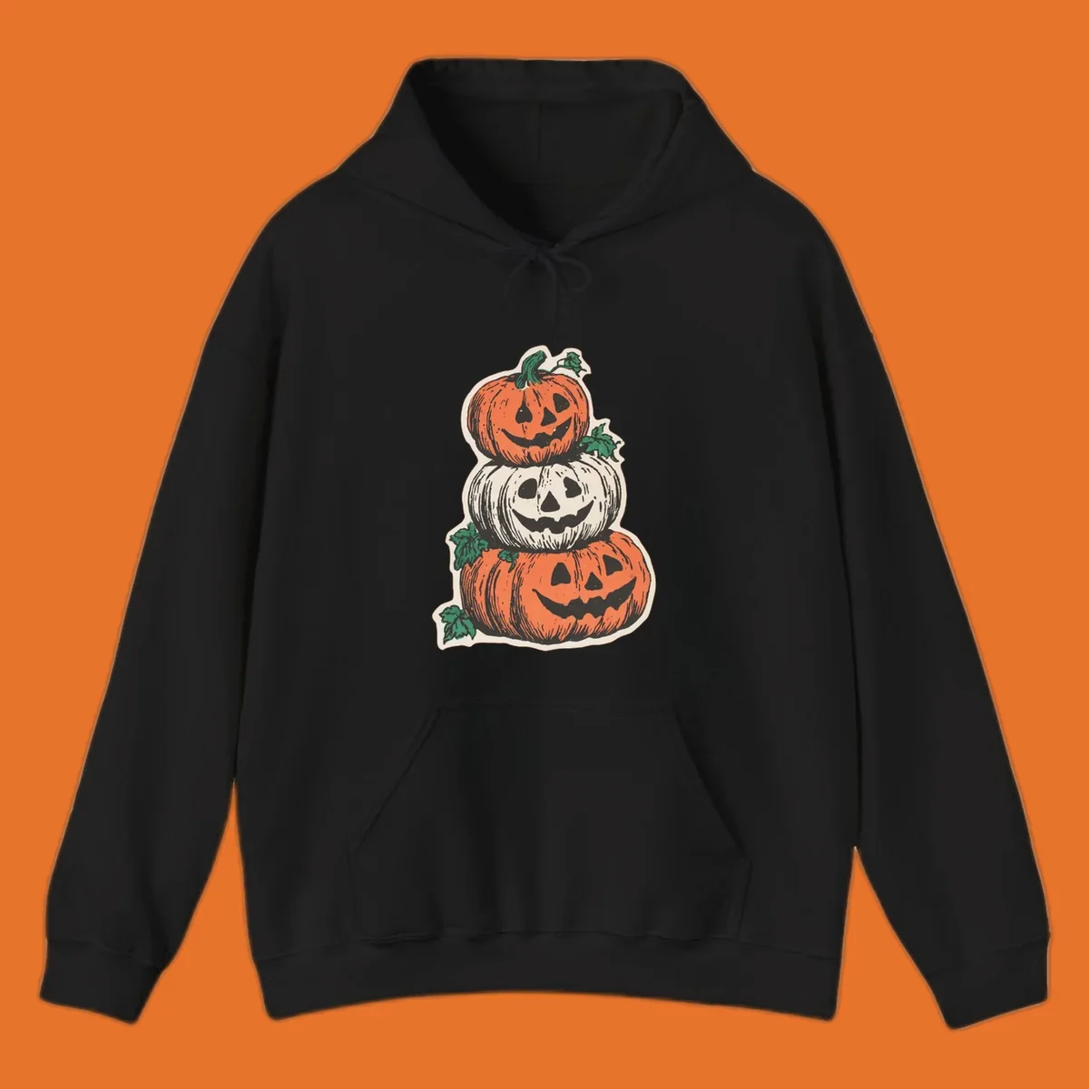 Stacked Halloween jack-o'-lanterns graphic with leaves for fall holiday shirts.