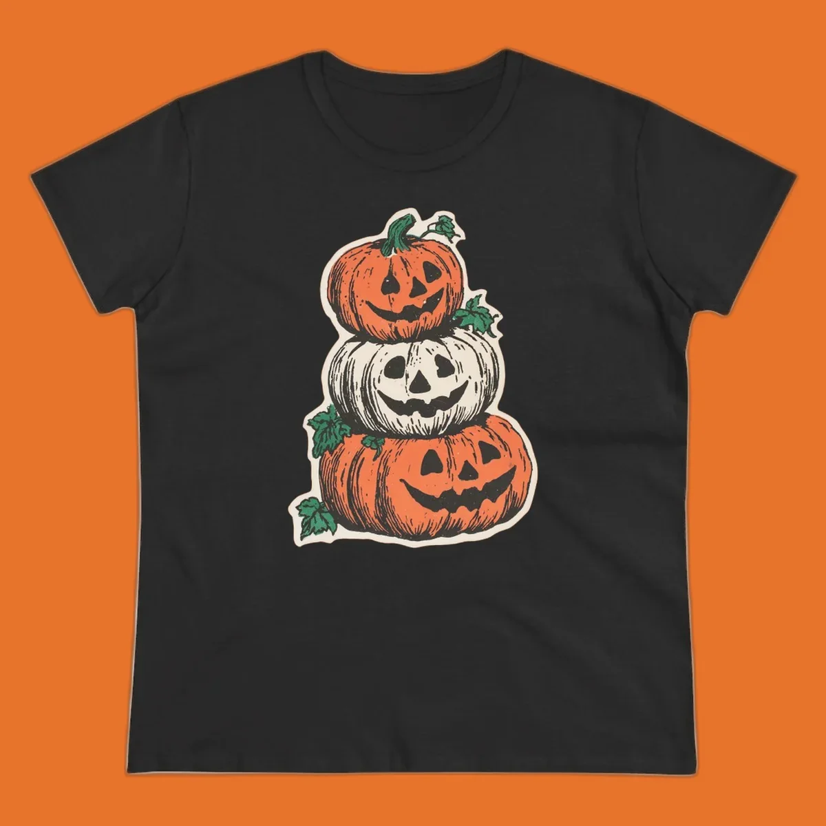 Stacked Halloween jack-o'-lanterns graphic with leaves for fall holiday shirts.