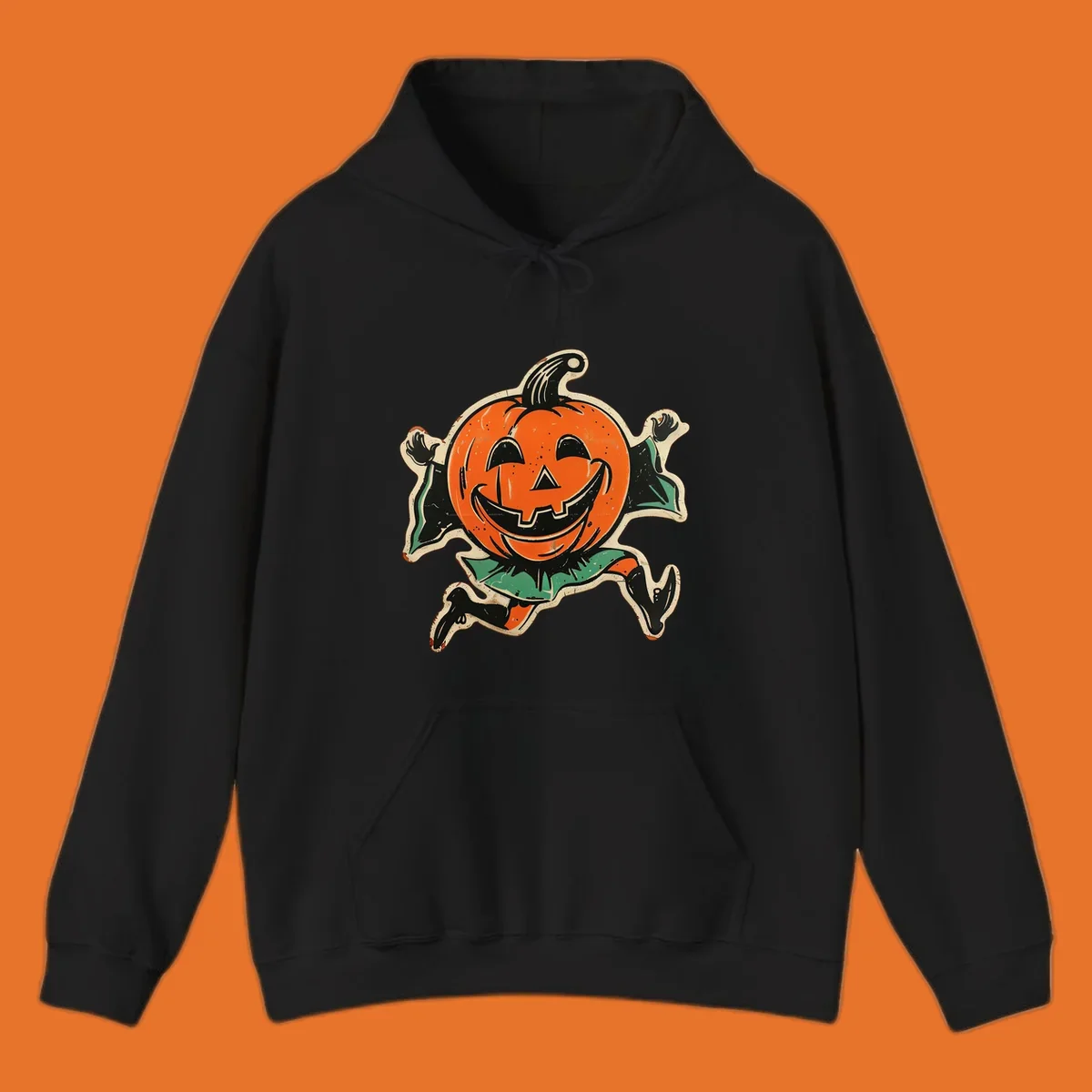 Vintage running jack-o'-lantern graphic with a big smile, black boots, and green leaves.
