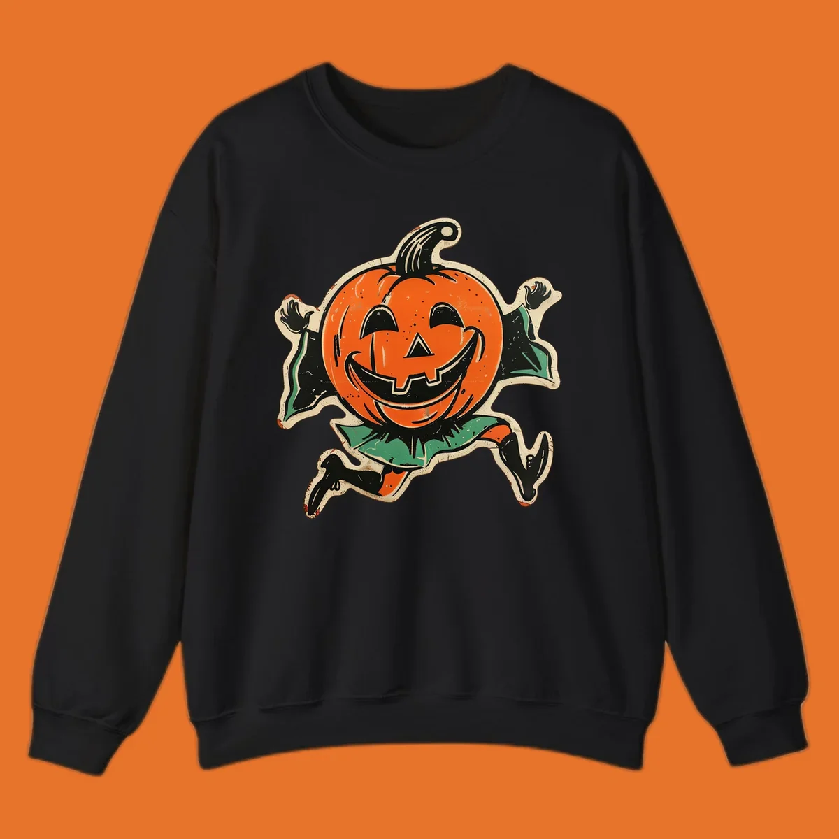 Vintage running jack-o'-lantern graphic with a big smile, black boots, and green leaves.