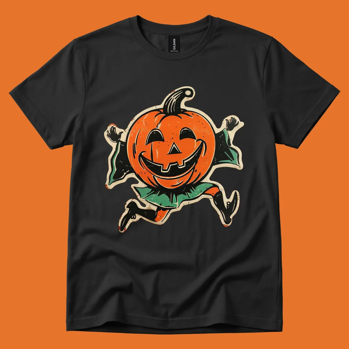 Vintage running jack-o'-lantern graphic with a big smile, black boots, and green leaves.