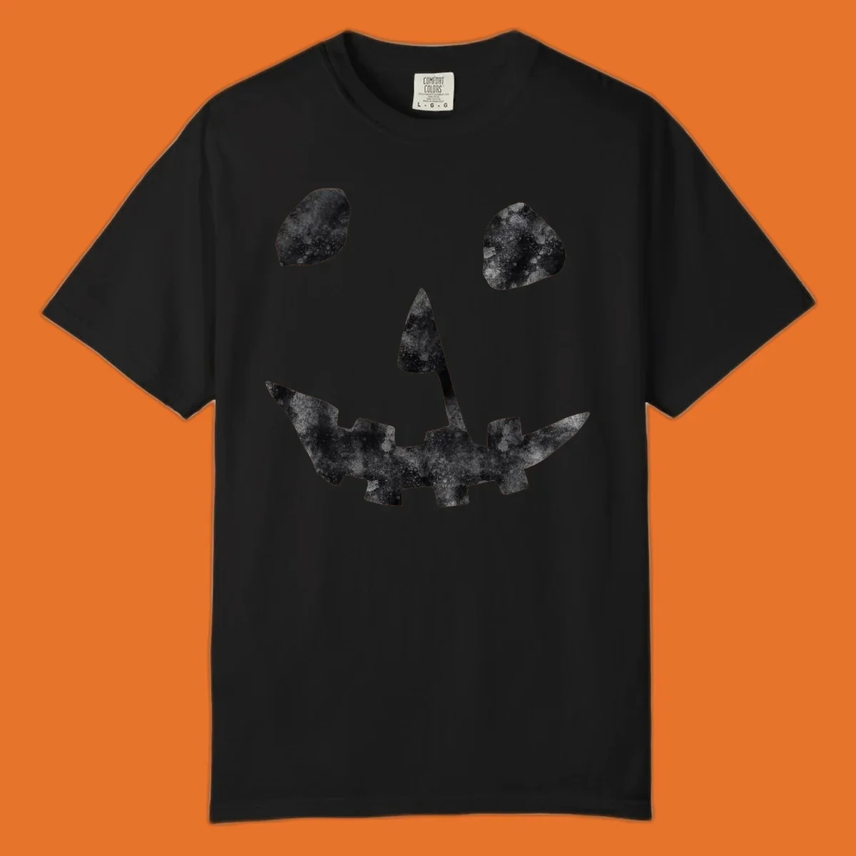 Spooky jack o lantern face graphic with distressed texture for Halloween.