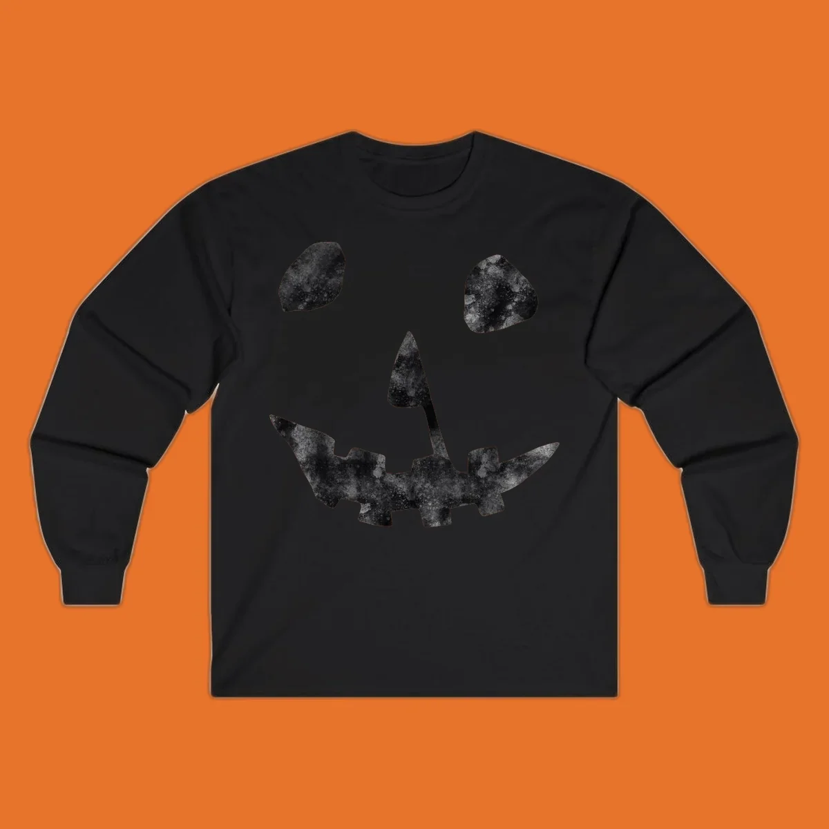 Spooky jack o lantern face graphic with distressed texture for Halloween.