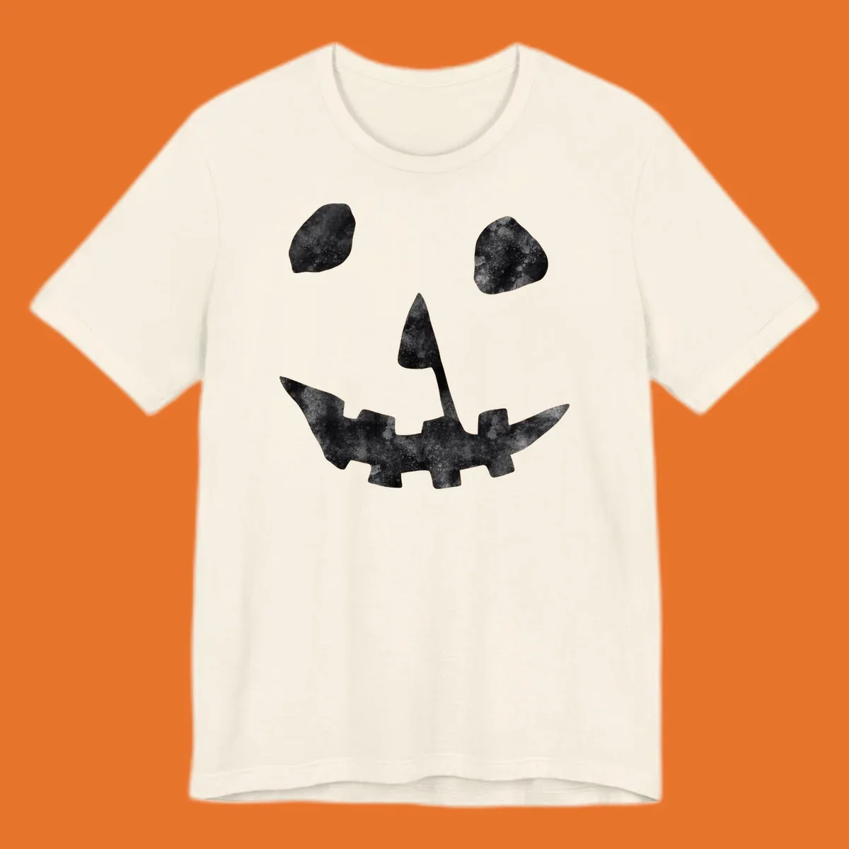Spooky jack o lantern face graphic with distressed texture for Halloween.