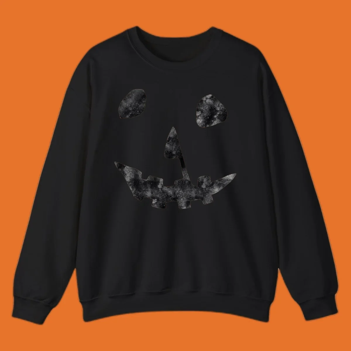 Spooky jack o lantern face graphic with distressed texture for Halloween.