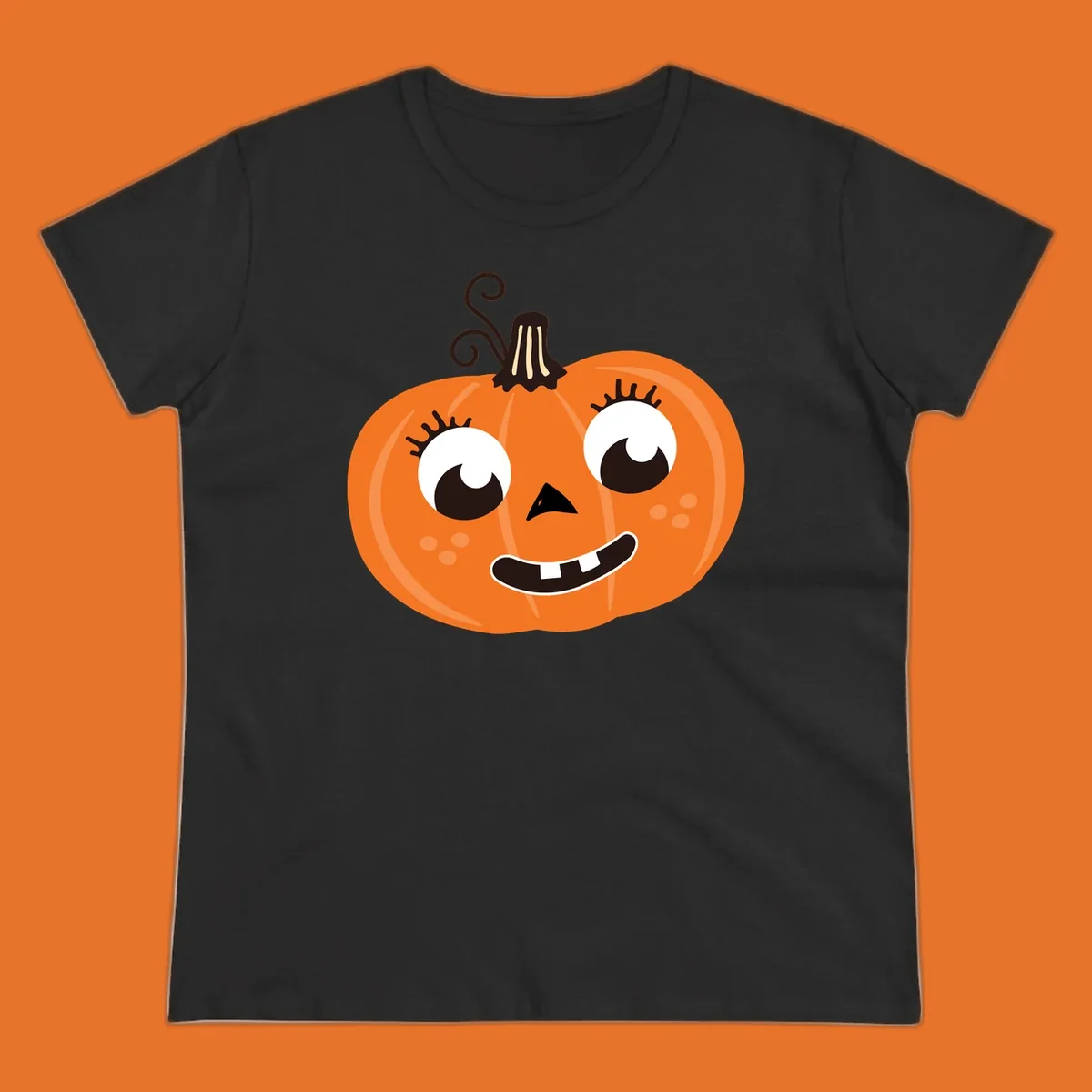Cute halloween pumpkin face graphic with big eyes and a smile.