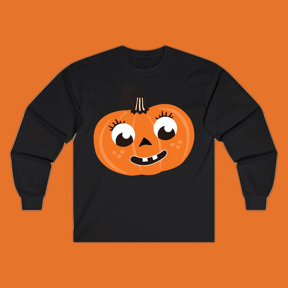 Cute halloween pumpkin face graphic with big eyes and a smile.