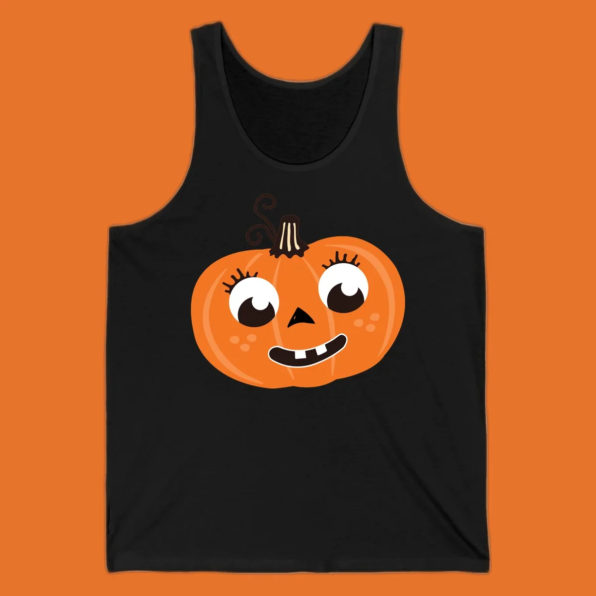 Cute halloween pumpkin face graphic with big eyes and a smile.