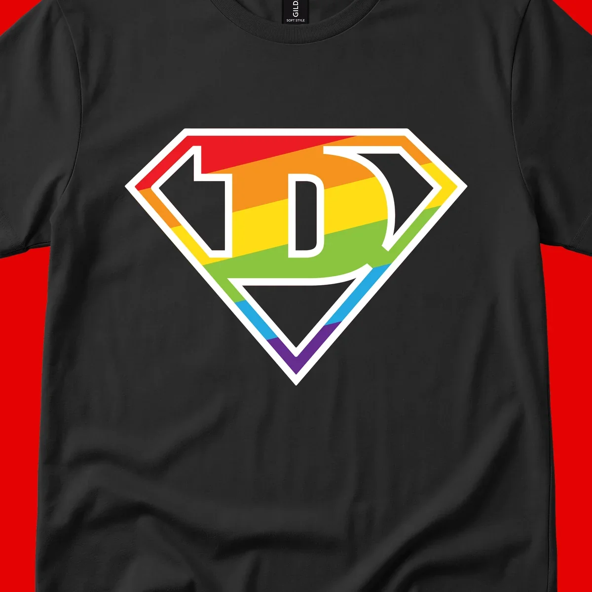 Rainbow pride shield with letter D centered, featuring red, orange, yellow, green, blue, and purple horizontal stripes with white chevron borders