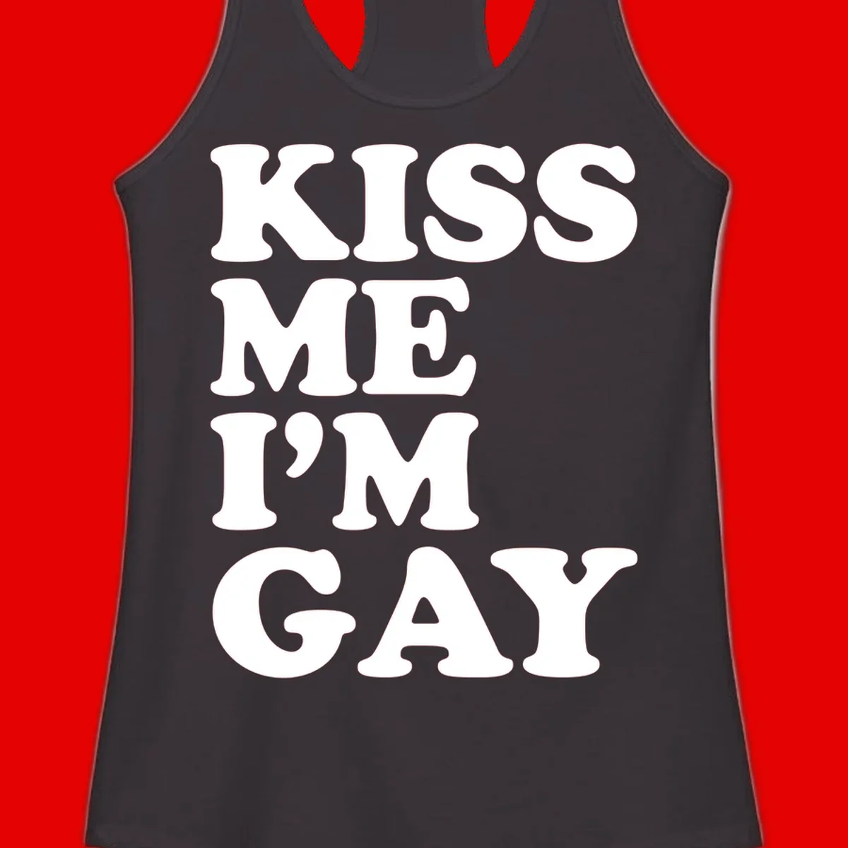 Bold white block letters spelling 'KISS ME I'M GAY' stacked vertically on gray background