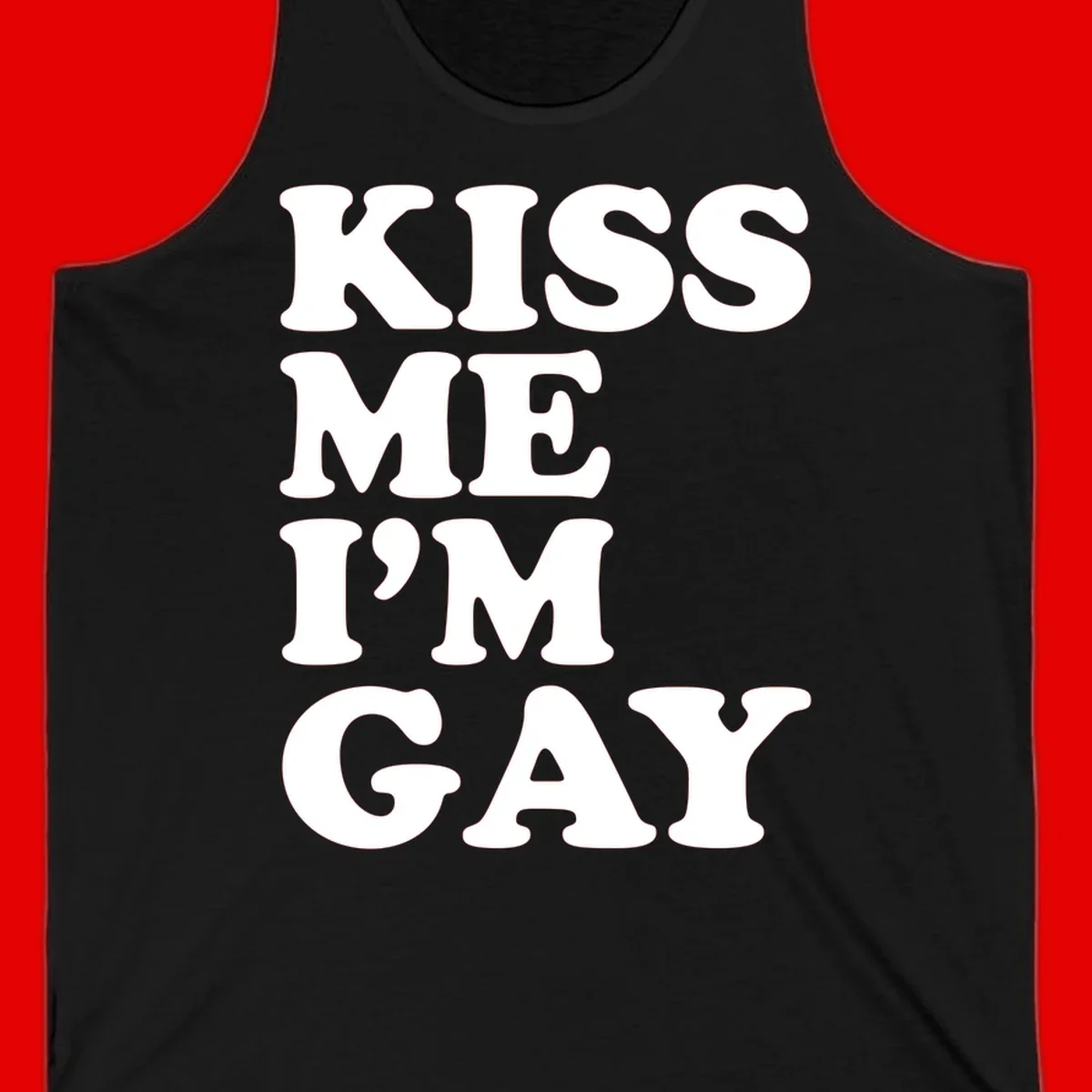 Bold white block letters spelling 'KISS ME I'M GAY' stacked vertically on gray background