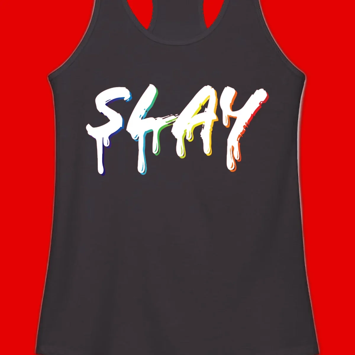 The word STAY in white letters with rainbow pride-colored paint drips flowing downward, featuring blue, teal, green, yellow, orange, and red colors on gray background