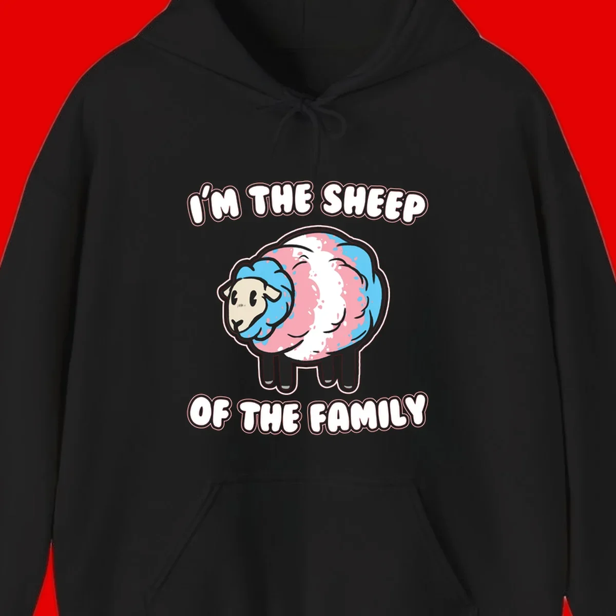 Cartoon sheep with blue and pink wool and text reading 'I'm The Sheep Of The Family'