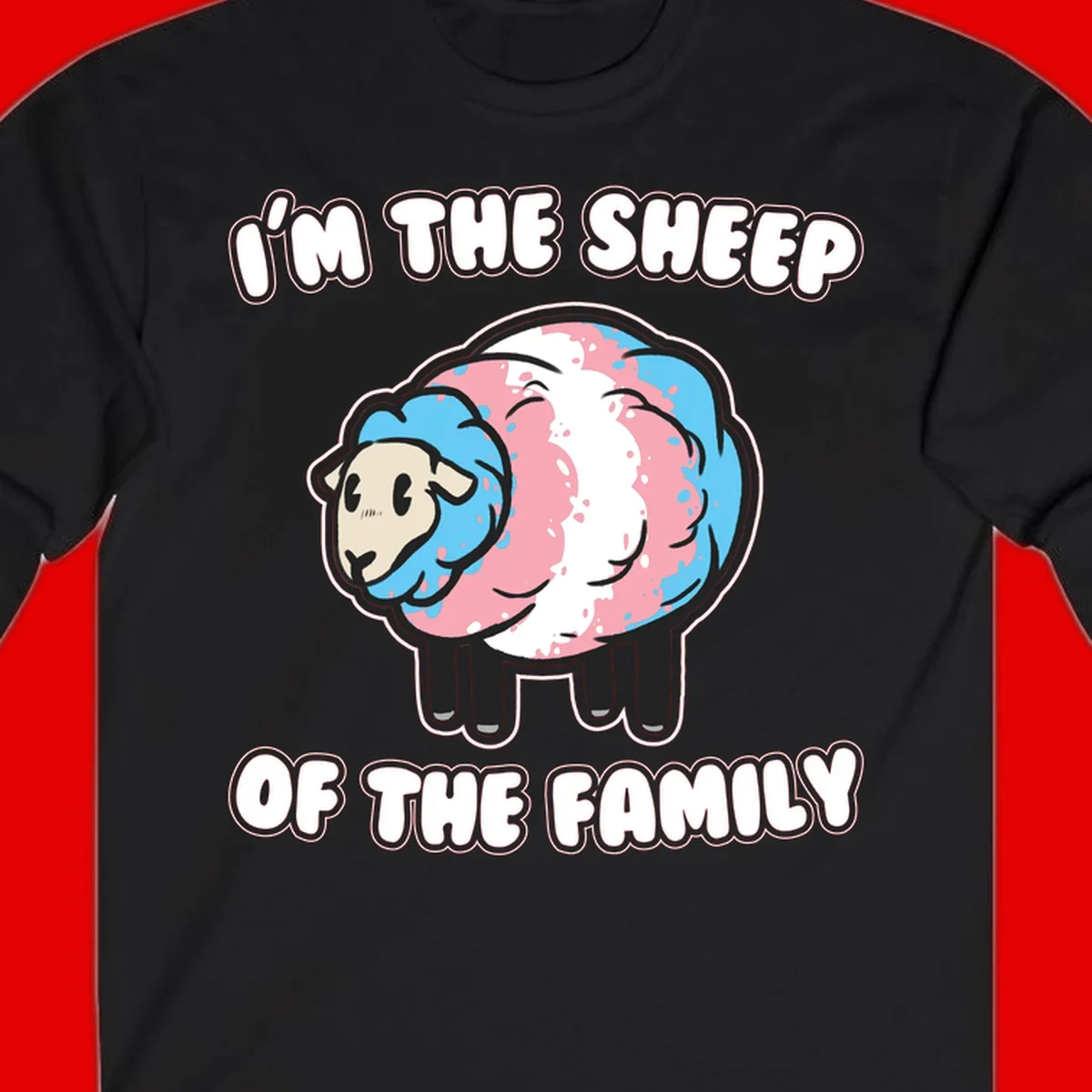 Cartoon sheep with blue and pink wool and text reading 'I'm The Sheep Of The Family'