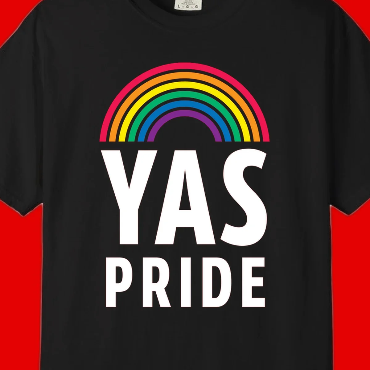 Yas pride rainbow design featuring colorful concentric rainbow arc above bold white text reading 'YAS PRIDE' on gray background