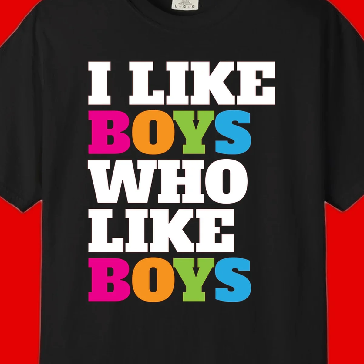 Colorful text design reading 'I Like Boys Who Like Boys' in magenta, orange, lime green, and cyan letters on gray background