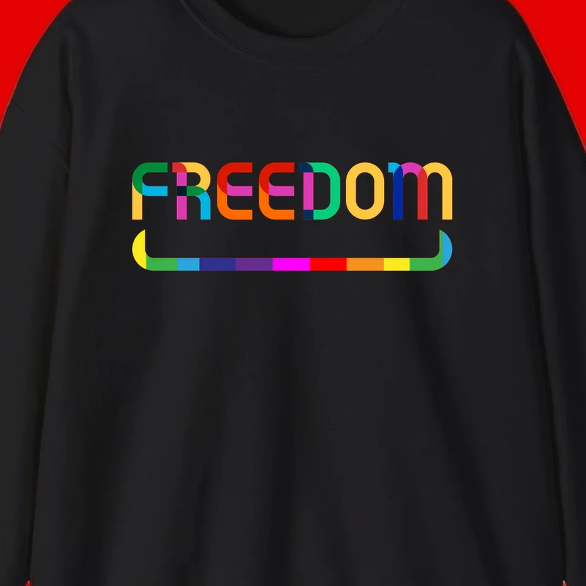 Colorful FREEDOM text in rainbow letters with geometric shapes and pride flag color bar below on gray background