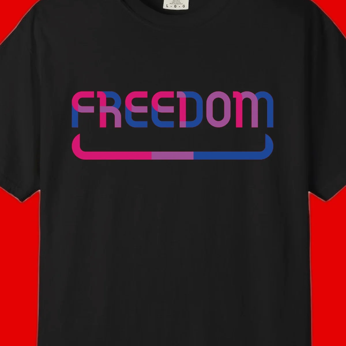 Freedom On Pride design: Bold magenta and purple 'FREEDOM' text with curved gradient underline transitioning from pink through purple to blue