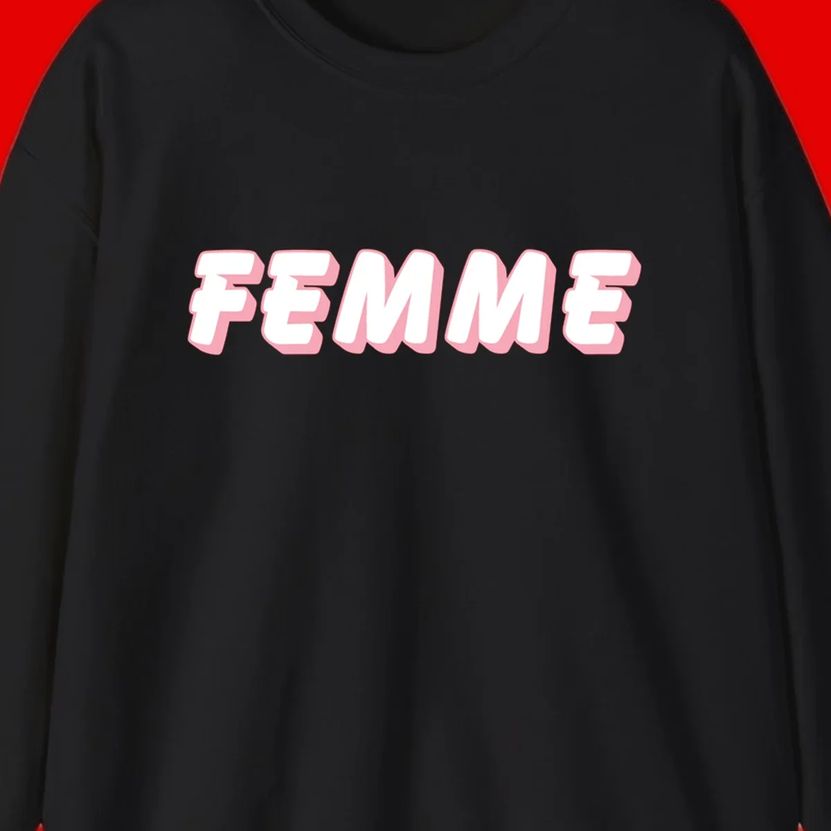 Bold 3D lettering spelling FEMME in white with pink dimensional shadowing on gray background
