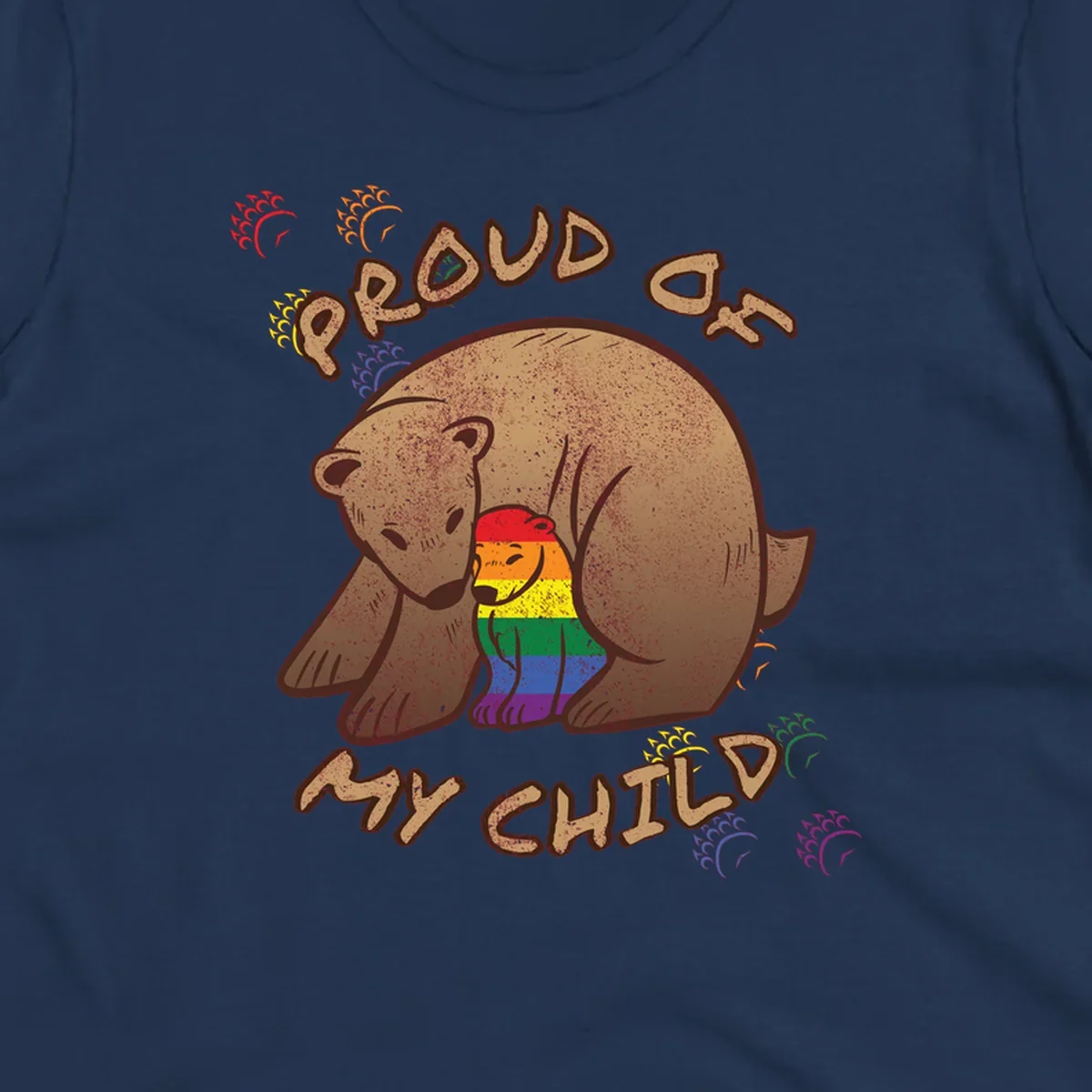 Brown bear proudly displaying rainbow pride colors with 'Proud As Shit' text and decorative bursts