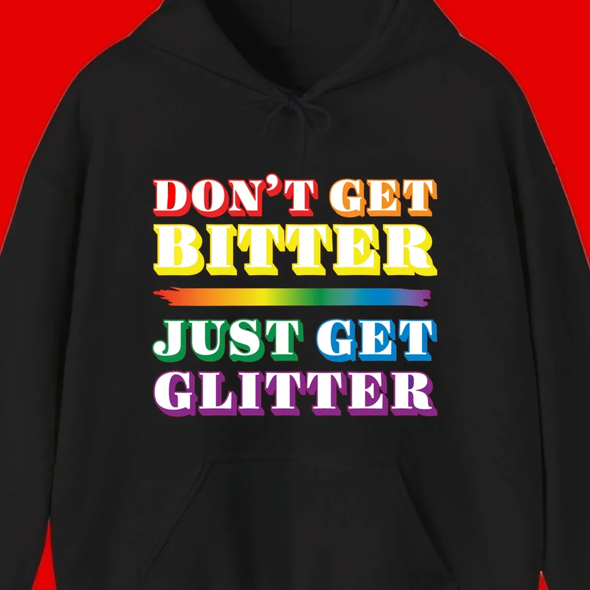 Colorful don't get bitter just get glitter pride design with rainbow gradient brush stroke and bold typography in red, orange, yellow, green, blue, and purple text
