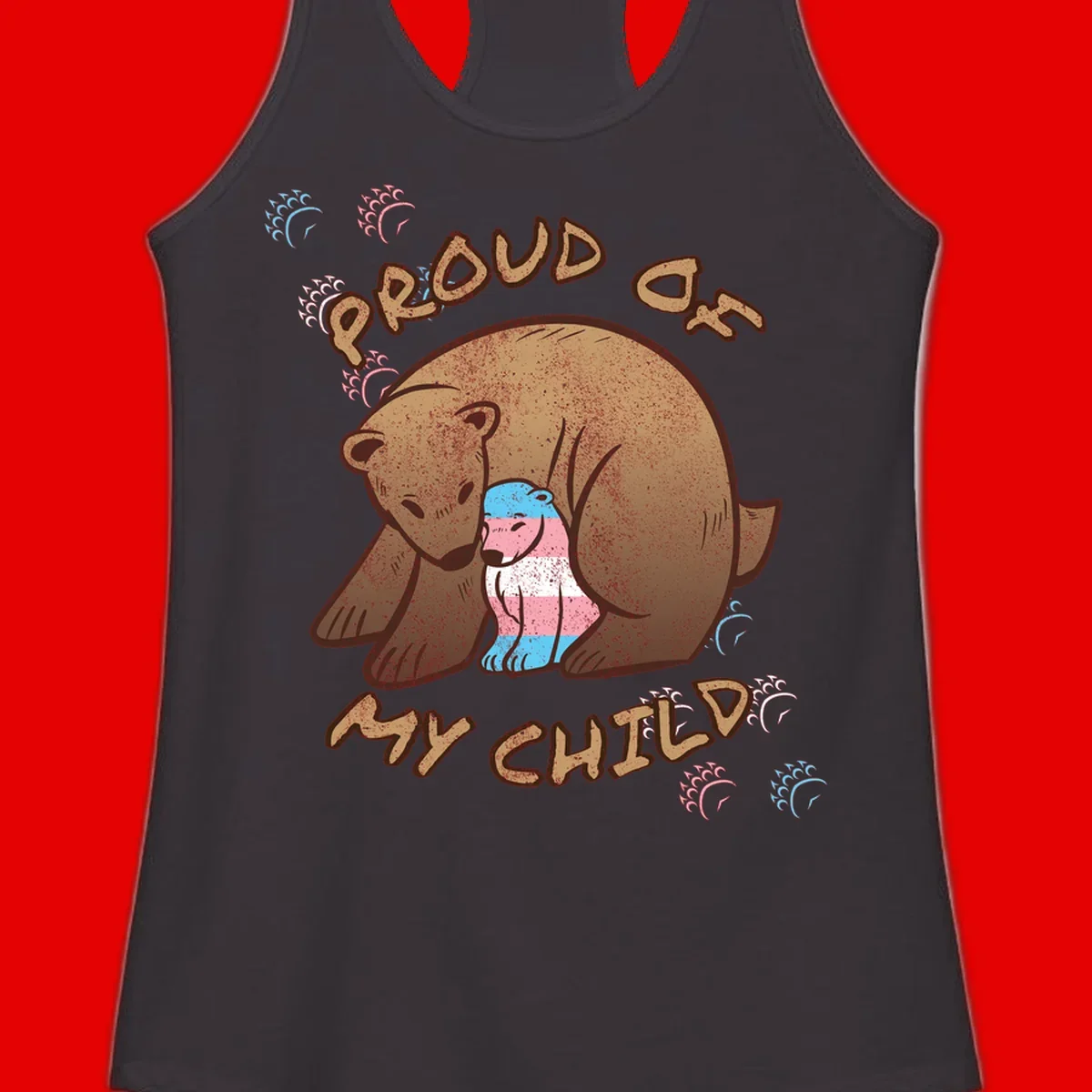 Brown bear holding a cub with blue, pink and white stripes, surrounded by 'Proud As My Chubby' text and decorative wave designs celebrating transgender pride