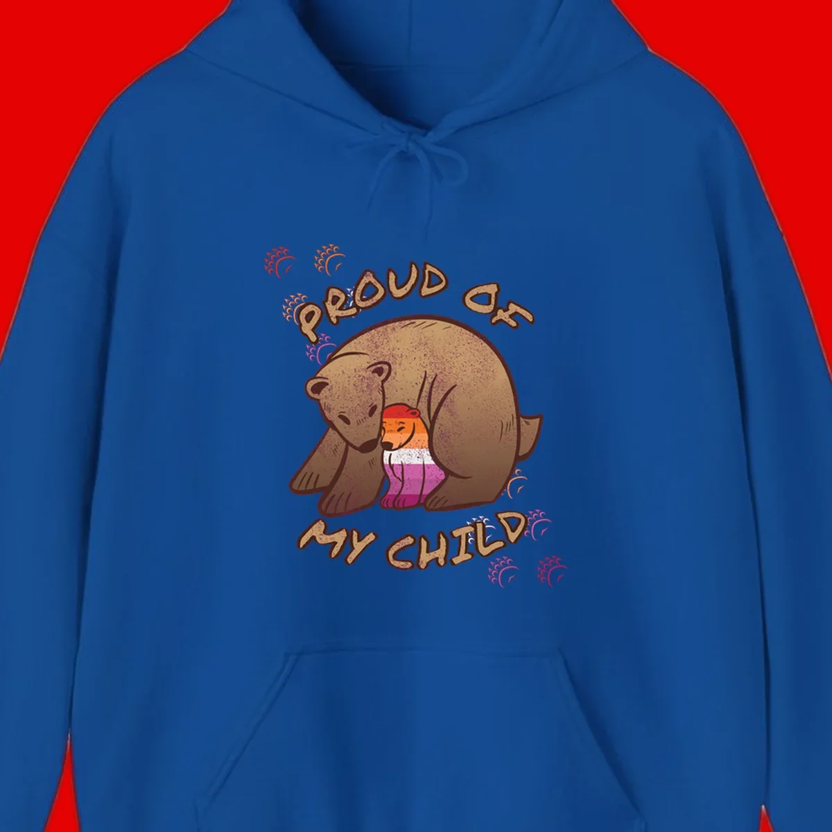 Brown bear proudly holding a sushi roll with pride flag stripes, surrounded by sparkles and text reading 'PROUD AS MY SUSHI'