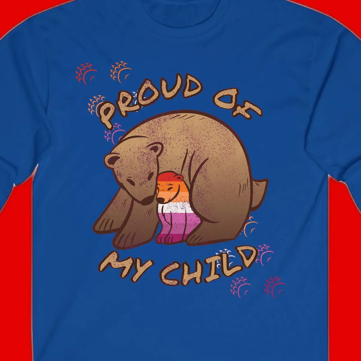 Brown bear proudly holding a sushi roll with pride flag stripes, surrounded by sparkles and text reading 'PROUD AS MY SUSHI'