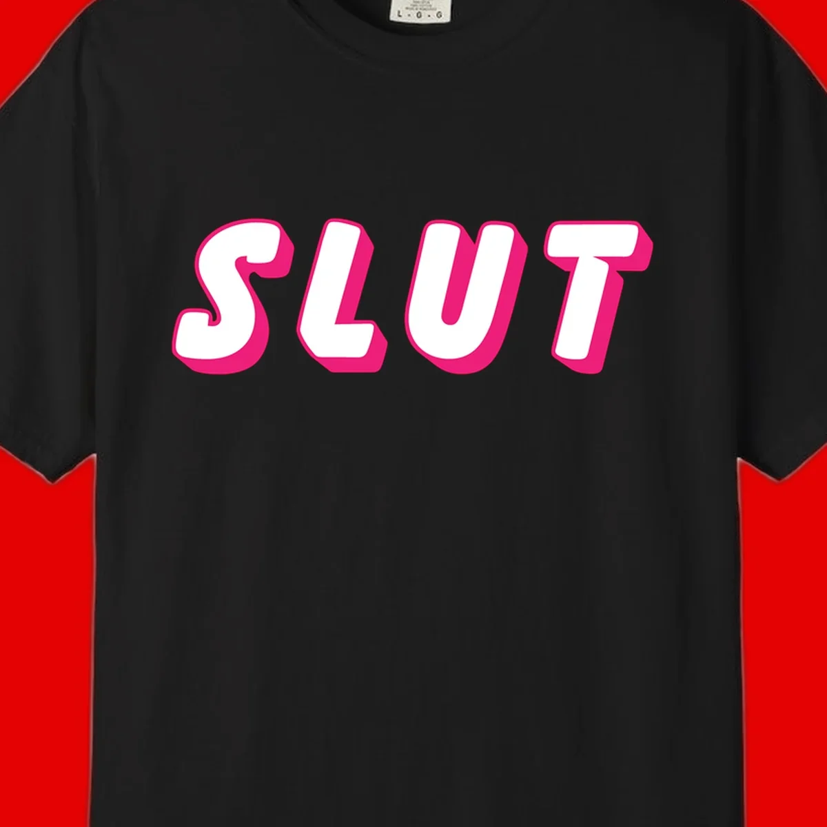 Bold magenta 3D block letters spelling 'SLUT' on gray background, slut-pride-statement design