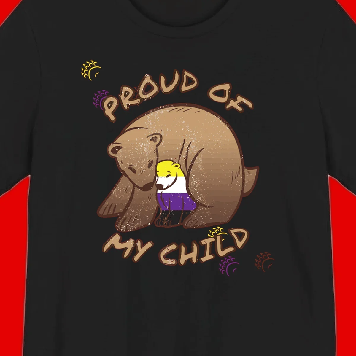 Illustration of a large brown bear's head in profile containing a small figure wearing pride flag colors, with text reading 'Proud As Child'