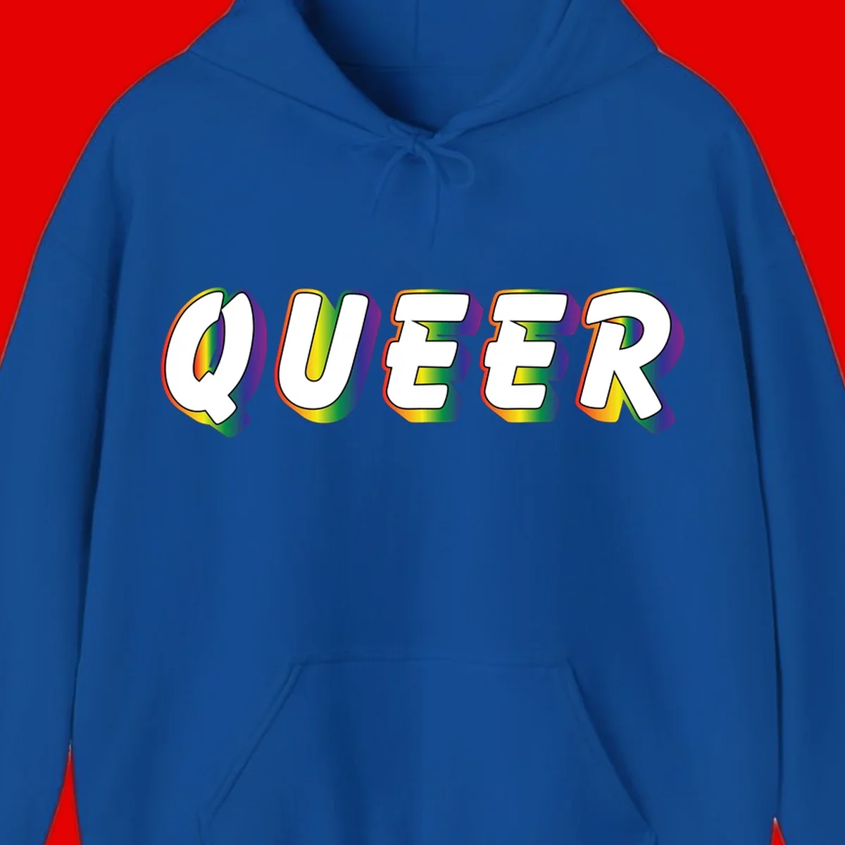 The word QUEER in large bold white letters with vibrant rainbow gradient fill and 3D orange outline effect on gray background